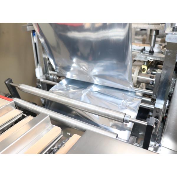 PLC Four Side Sealing Packaging Machine Mask Facial Heating Pad Packaging
