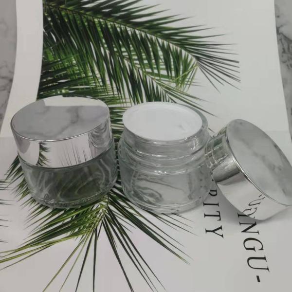 MSDS Clear 100g Glass Cream Jar With Shiny Silver Cap White Lid Mask Mud