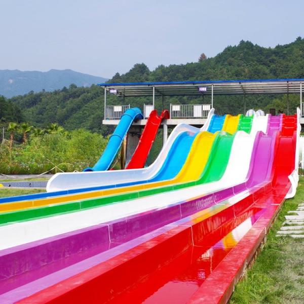 Customised Water Park Equipment Rainbow Pool Slide 180 Guests/Hr For Each Slide
