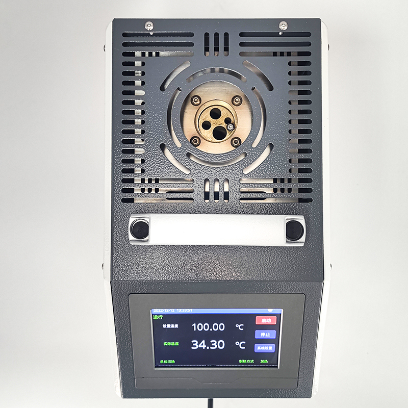 Dry Well Temperature Calibrator side view showing insertion wells and portability features
