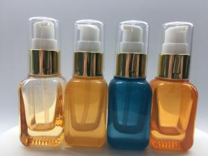 Buy cheap SGS ISO MSDS Orange Blue 20ml Glass Pump Bottle For Lotion And Serum product