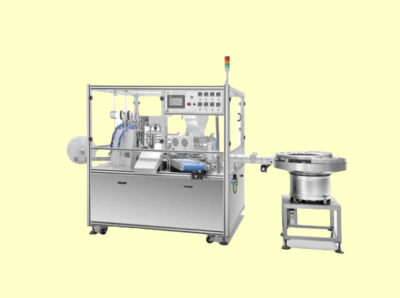 Automatic Filling of Granular Desiccant and Assembling of Block Preservative