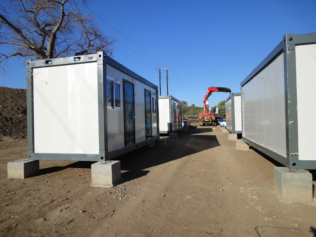 Multi-functional demountable Small Cheap Tiny Home Prefab House Cottages Container House Office Dormitory Manufacturer