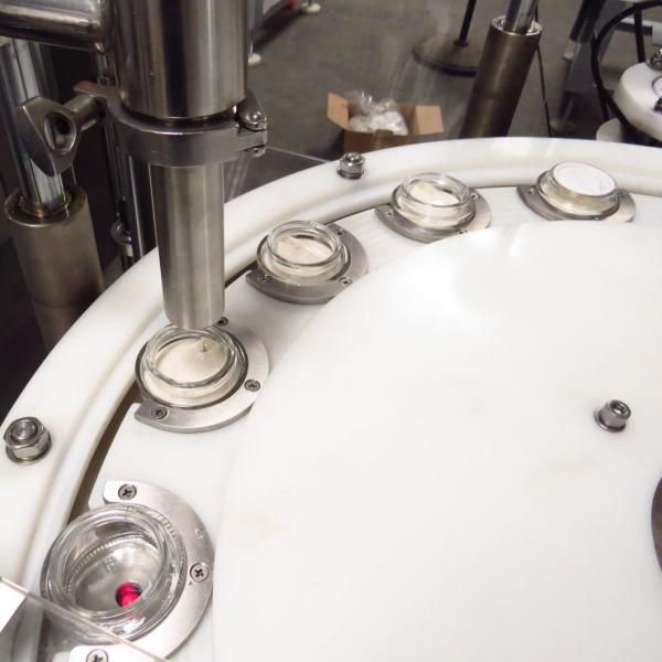 Npack Automatic Cosmetic Cream Bottle Filling Capping Machine for Glass Jar